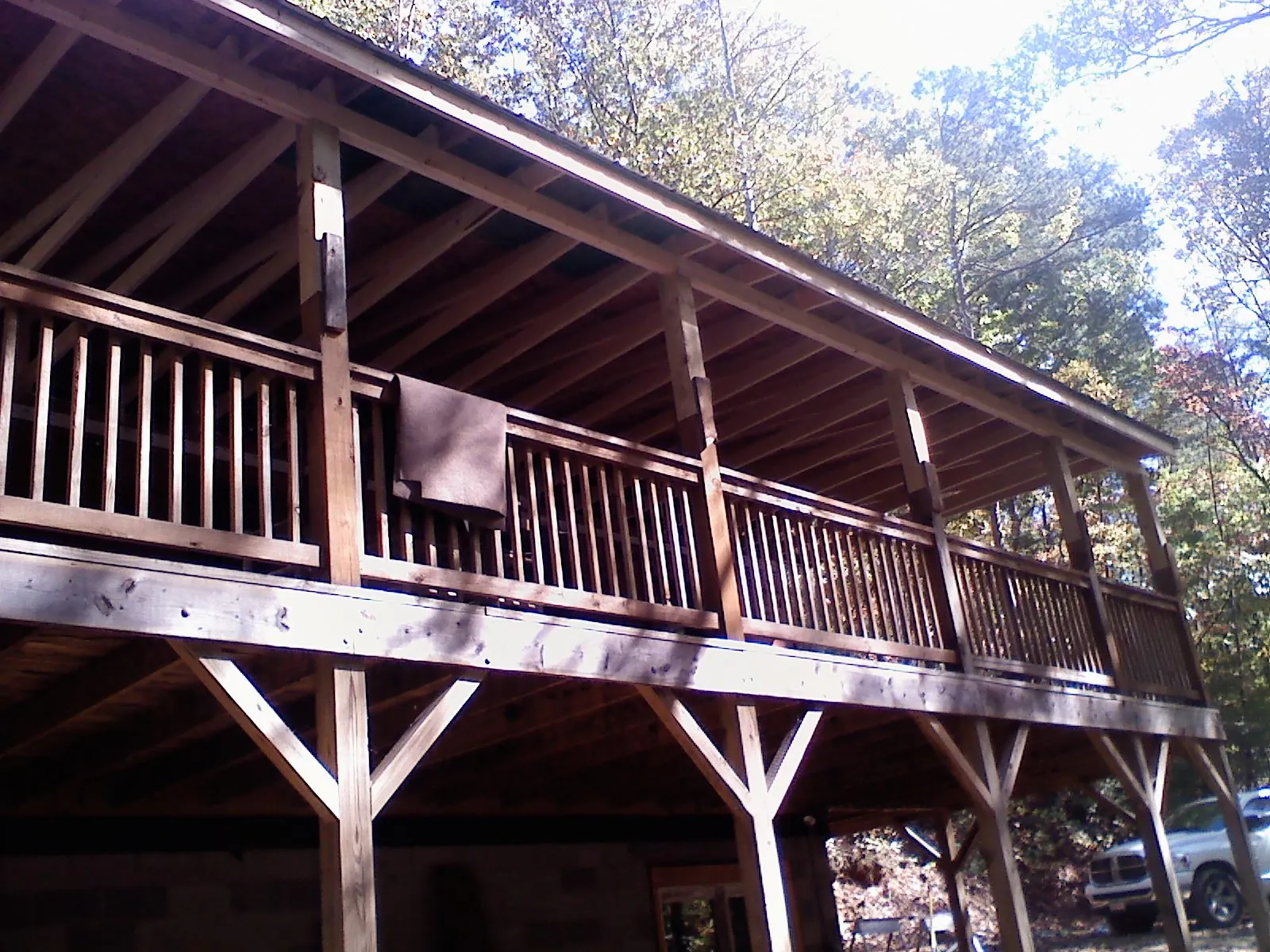 Timber framing under a new elevated porch and deck — Roof Leak Repair in Westhampton by Roofing Brothers